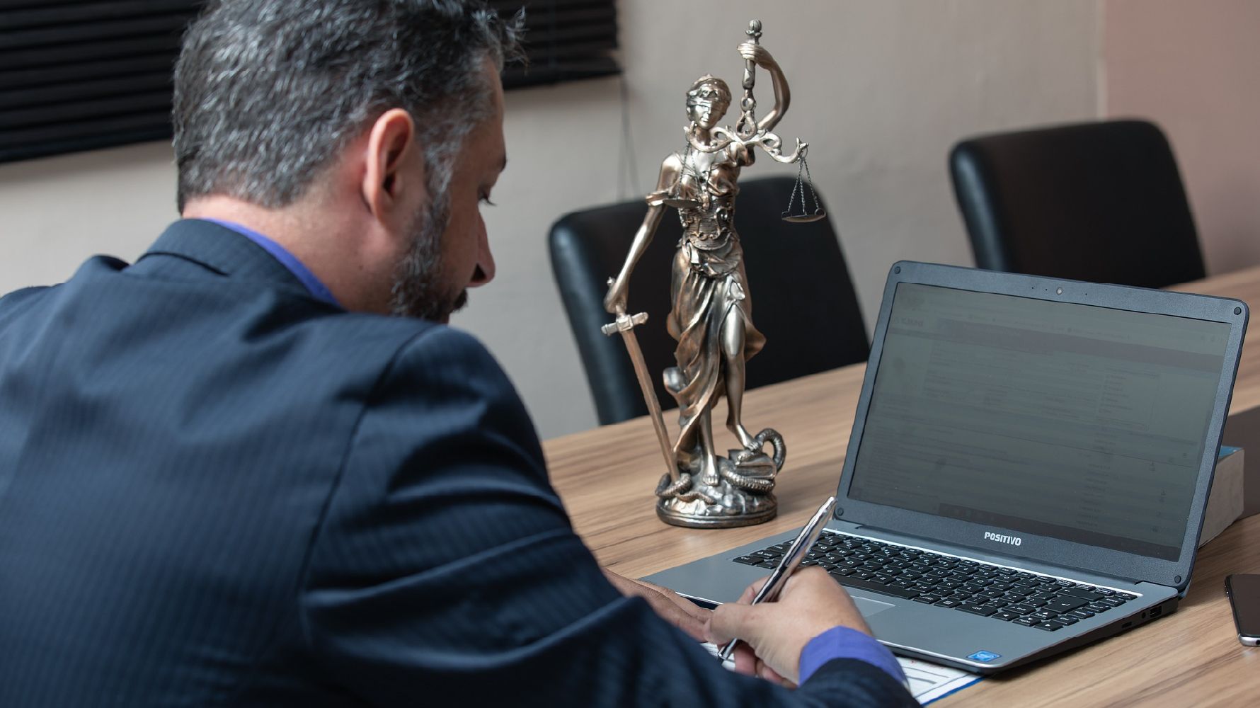 Man reviewing legal documentation